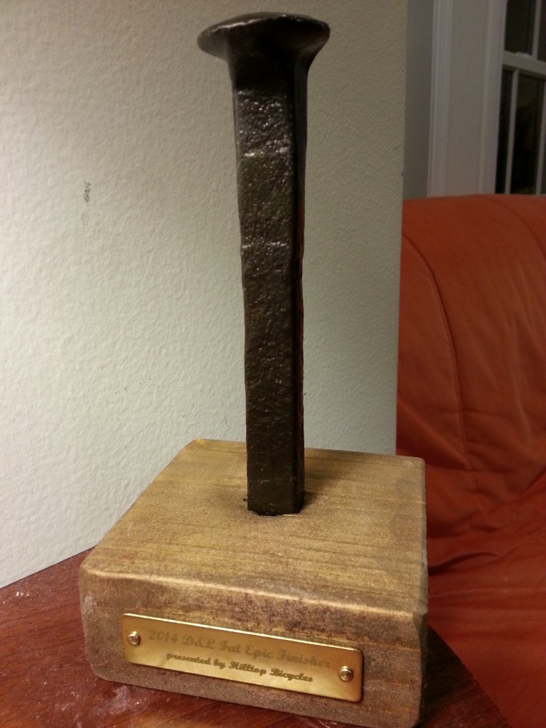 The finishers' trophy, railroad spikes I believe actually collected from the trailside.